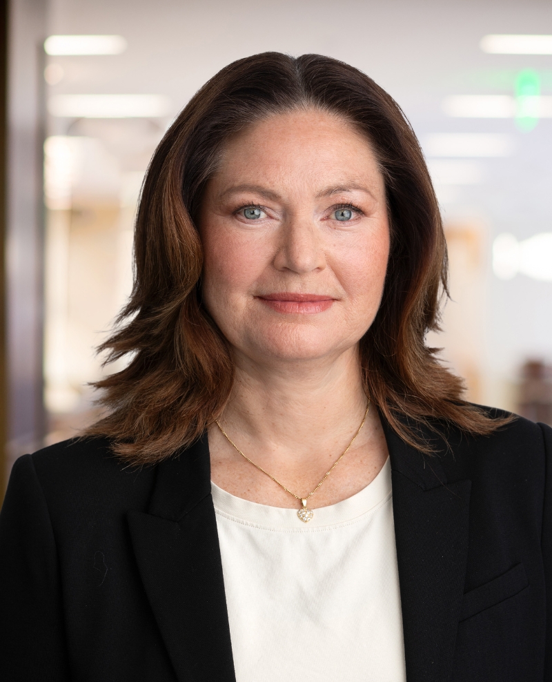 Portrait of Sophie Linghag, Head of Fair Play, RG & AML at ATG, wearing a black blazer and white top in an office setting.