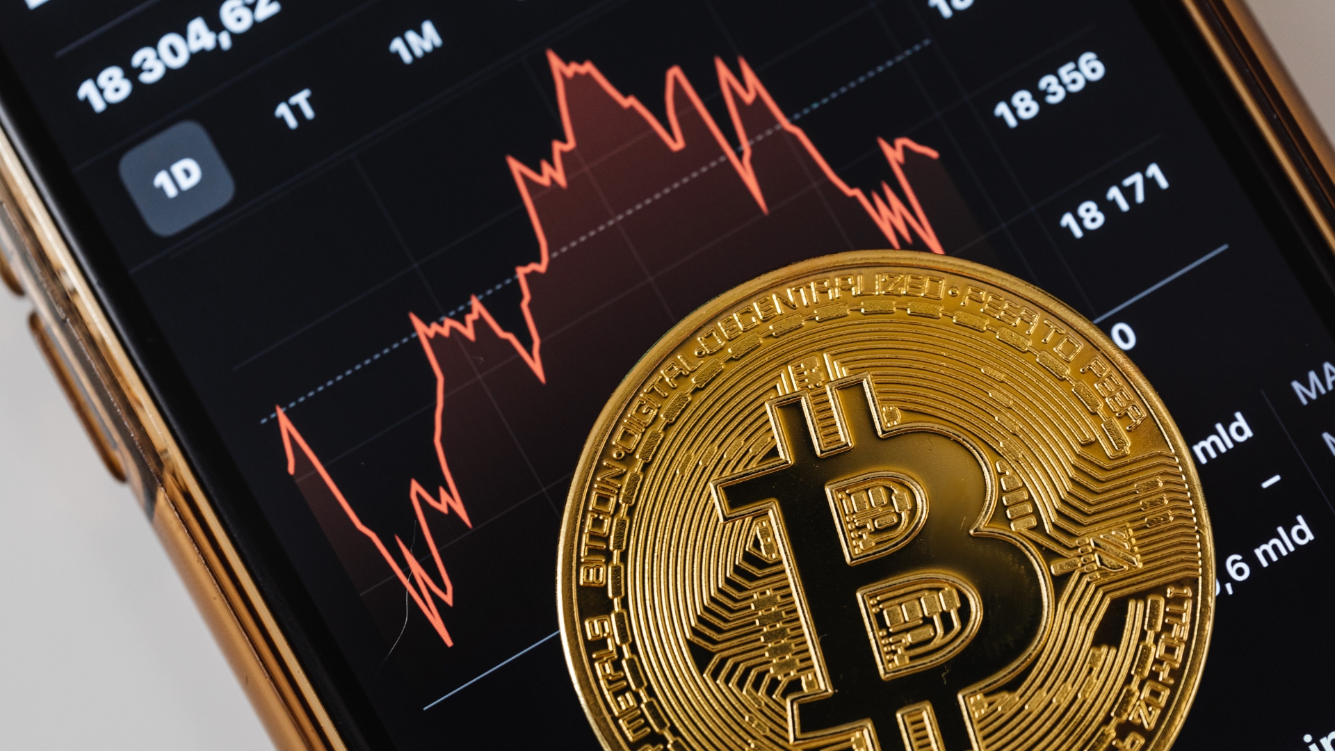 A photo of a crypto wallet with a Bitcoin image